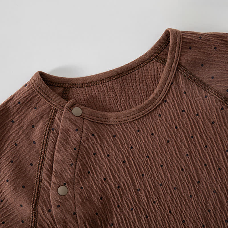 Tutina per neonati con pois e orsetto, chiusura frontale con bottoni. - image 6