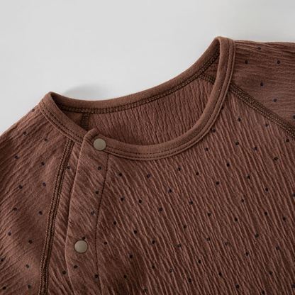 Tutina per neonati con pois e orsetto, chiusura frontale con bottoni. - image 6