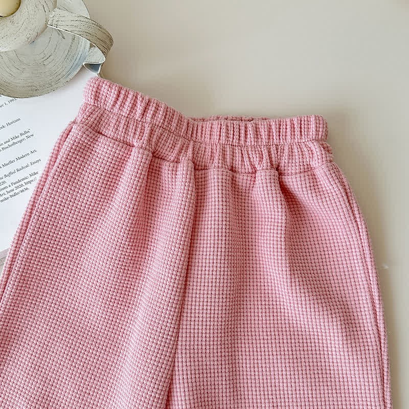 Set da 2 pezzi per bambini, composto da felpa e pantaloni a nido d'ape in tinta unita - image 6