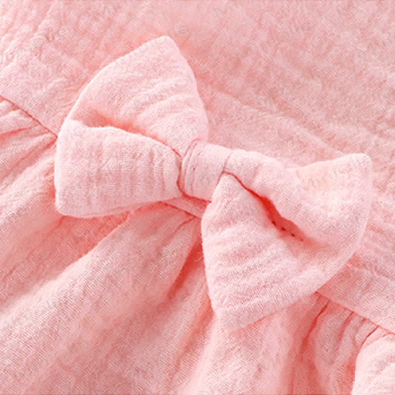 Completo da bambina composto da canotta e pantaloncini in cotone a tinta unita con volant. - image 7