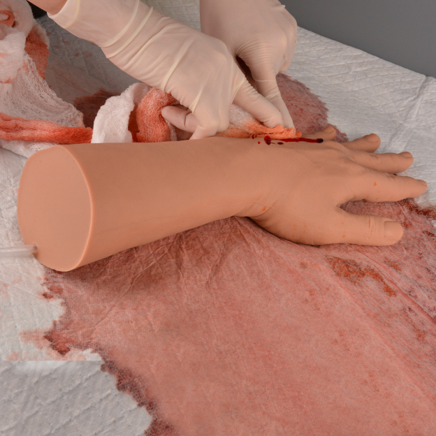 Wound Packing Practice Using Trauma Simulator Hand