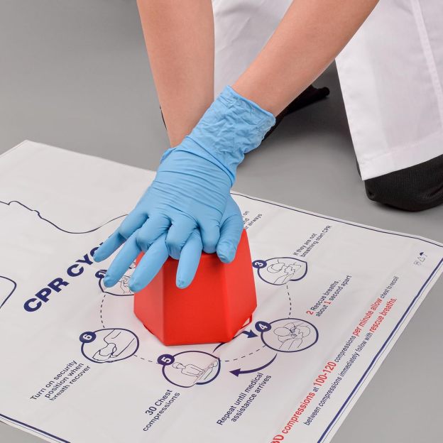 Medical Student Practicing CPR Compression Techniques