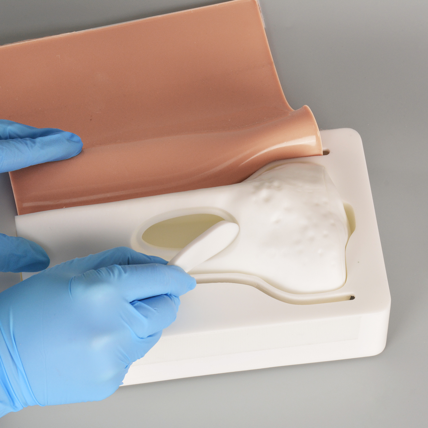 Reusable IO Training Bone Model with Replaceable Bone Pads