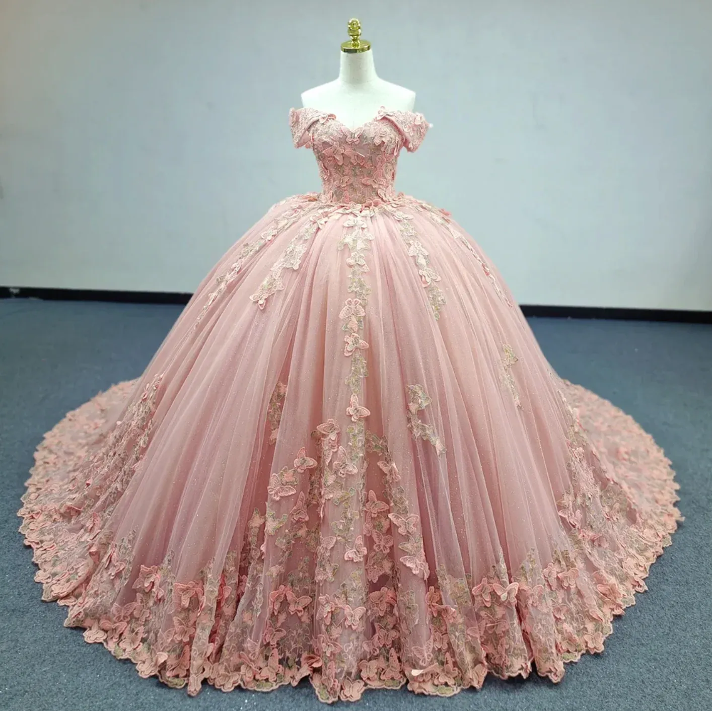 Off-the-Shoulder Pink Ball Gown with Floral Appliqued Long Quinceanera Dress