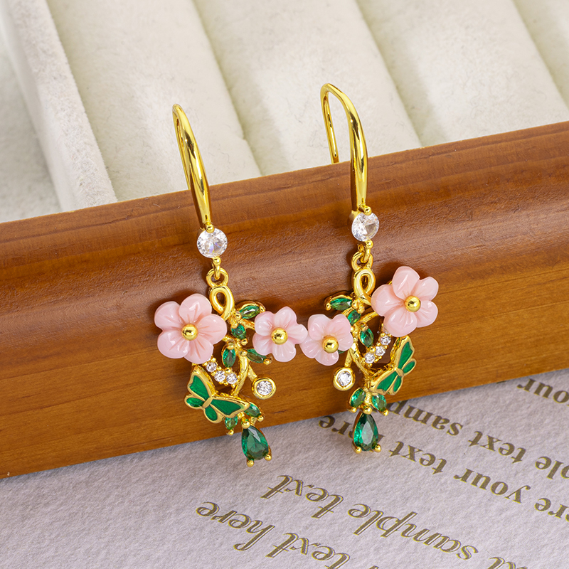 Carved Plum Blossom Natural Queen Conch Stud Earrings