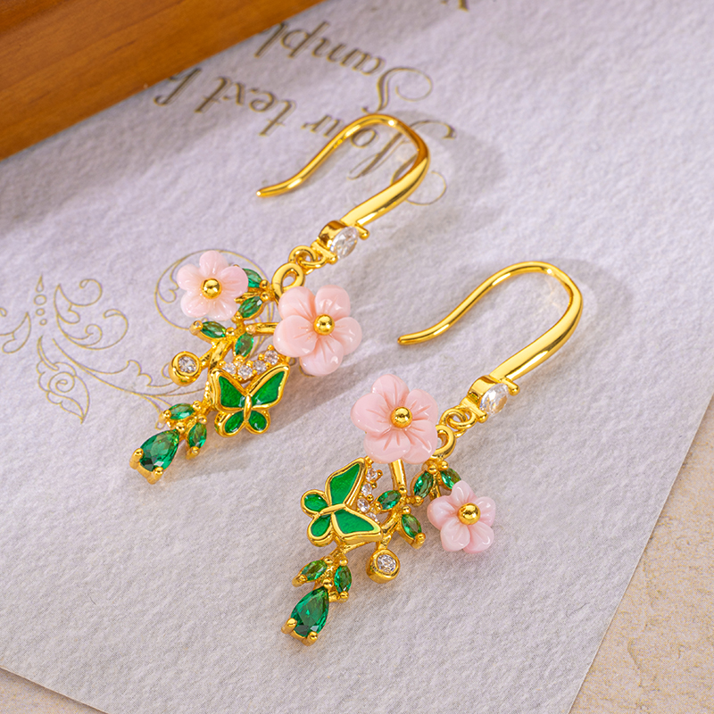 Carved Plum Blossom Natural Queen Conch Stud Earrings