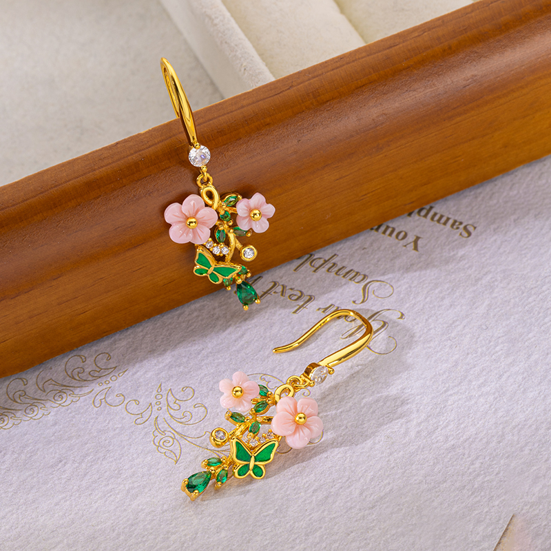 Carved Plum Blossom Natural Queen Conch Stud Earrings