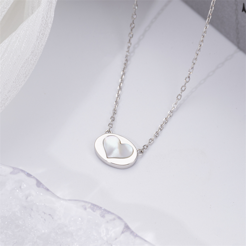 Minimalist Luxury: White Shell Heart Pendant for Women