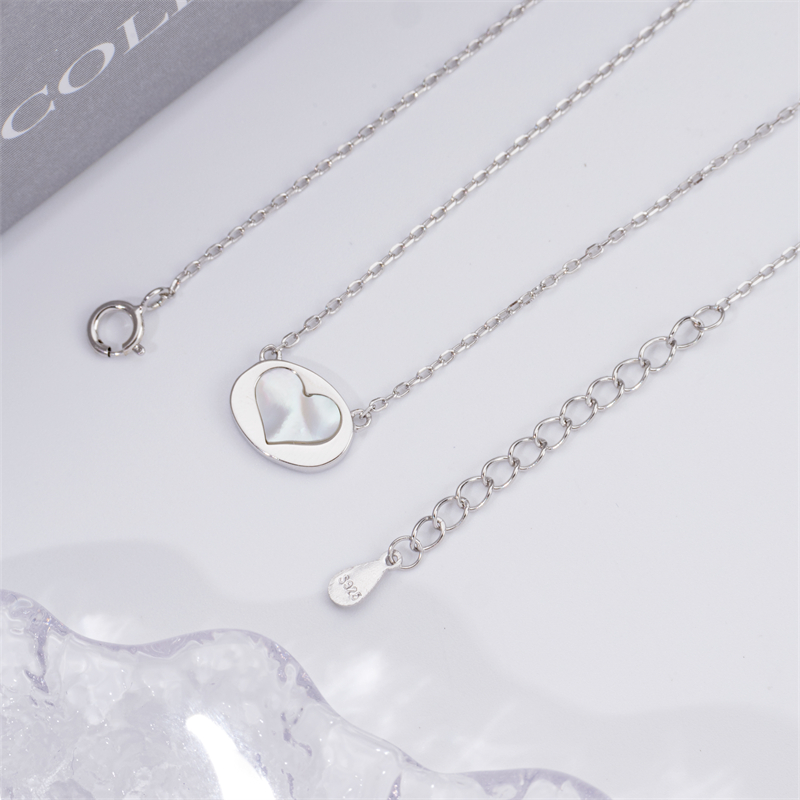 Minimalist Luxury: White Shell Heart Pendant for Women