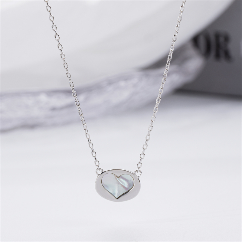 Minimalist Luxury: White Shell Heart Pendant for Women