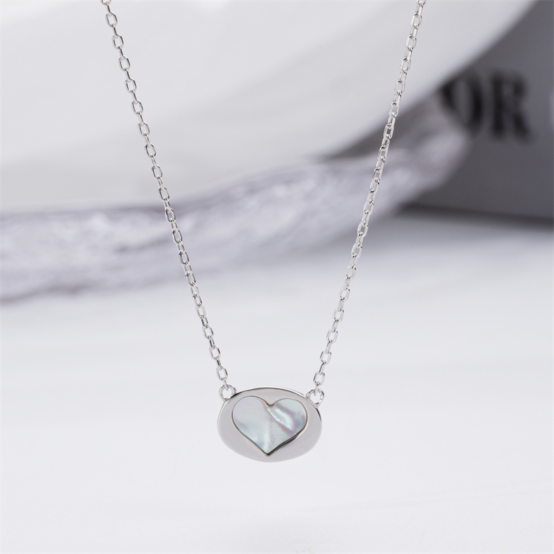 Minimalist Luxury: White Shell Heart Pendant for Women
