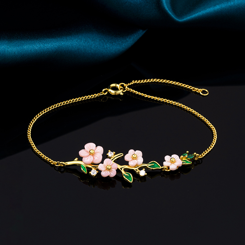 Charming Queen Conch Bracelet: Carved Plum Flowers & Green Leaves