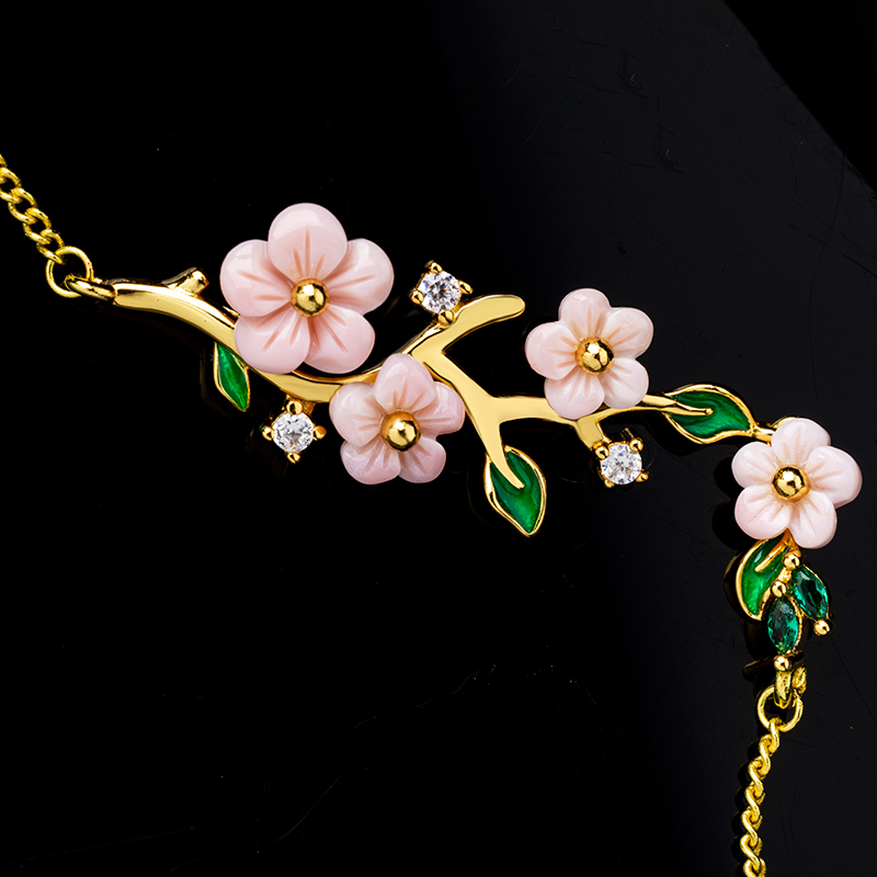 Charming Queen Conch Bracelet: Carved Plum Flowers & Green Leaves