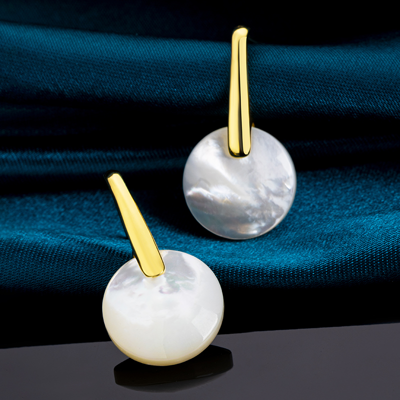 Geometric Hoops Flattering for Round Faces