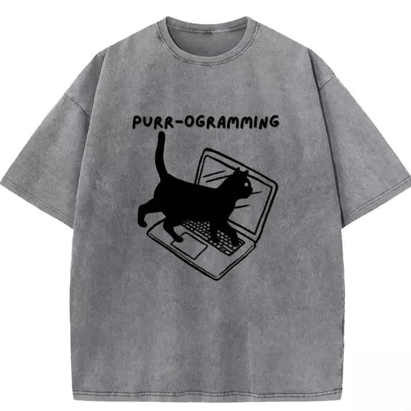 Lightweight PURR-OGRAMMING washed t-shirt for cat lovers, featuring a playful graphic and soft cotton fabric.