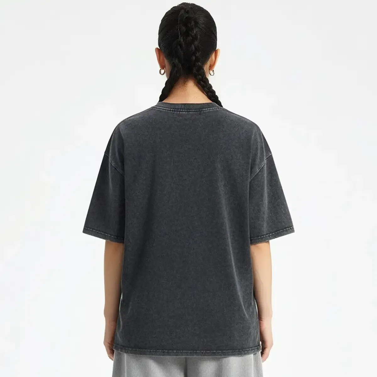 Washed T-shirt featuring a playful smoking cat graphic, perfect for casual wear and animal lovers.