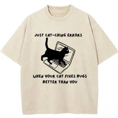 Humorous washed T-shirt featuring "When Your Cat Fixes Bugs Better Than You" graphic, perfect for cat lovers and programmers.