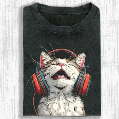 Happy DJ Cat graphic on a stylish washed t-shirt, perfect for cat lovers and music fans.