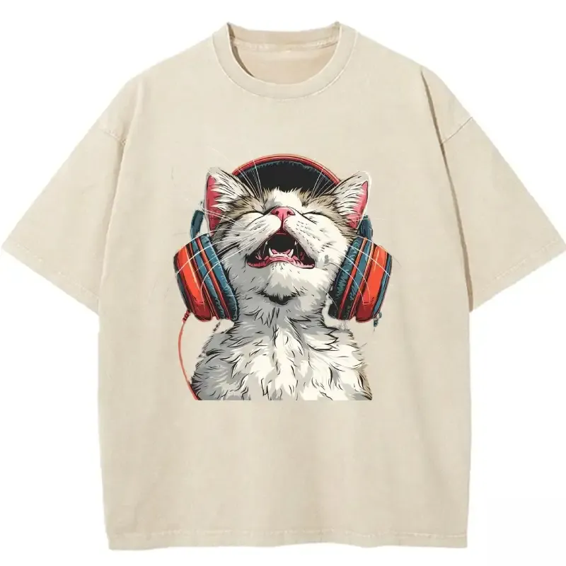 Happy DJ Cat graphic on a trendy washed T-shirt for cat lovers and music enthusiasts. Perfect casual wear!
