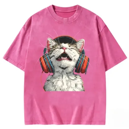 Happy DJ Cat graphic on a trendy washed t-shirt, perfect for cat lovers and music enthusiasts.