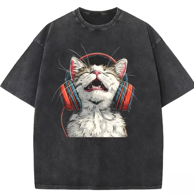 Happy DJ Cat graphic on a washed T-shirt, perfect for casual wear and cat lovers.