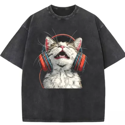Happy DJ Cat graphic on a washed T-shirt, perfect for casual wear and cat lovers.