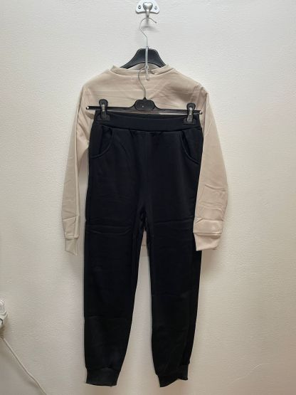 XBA9355 | Tuta con cuore brillantinato 