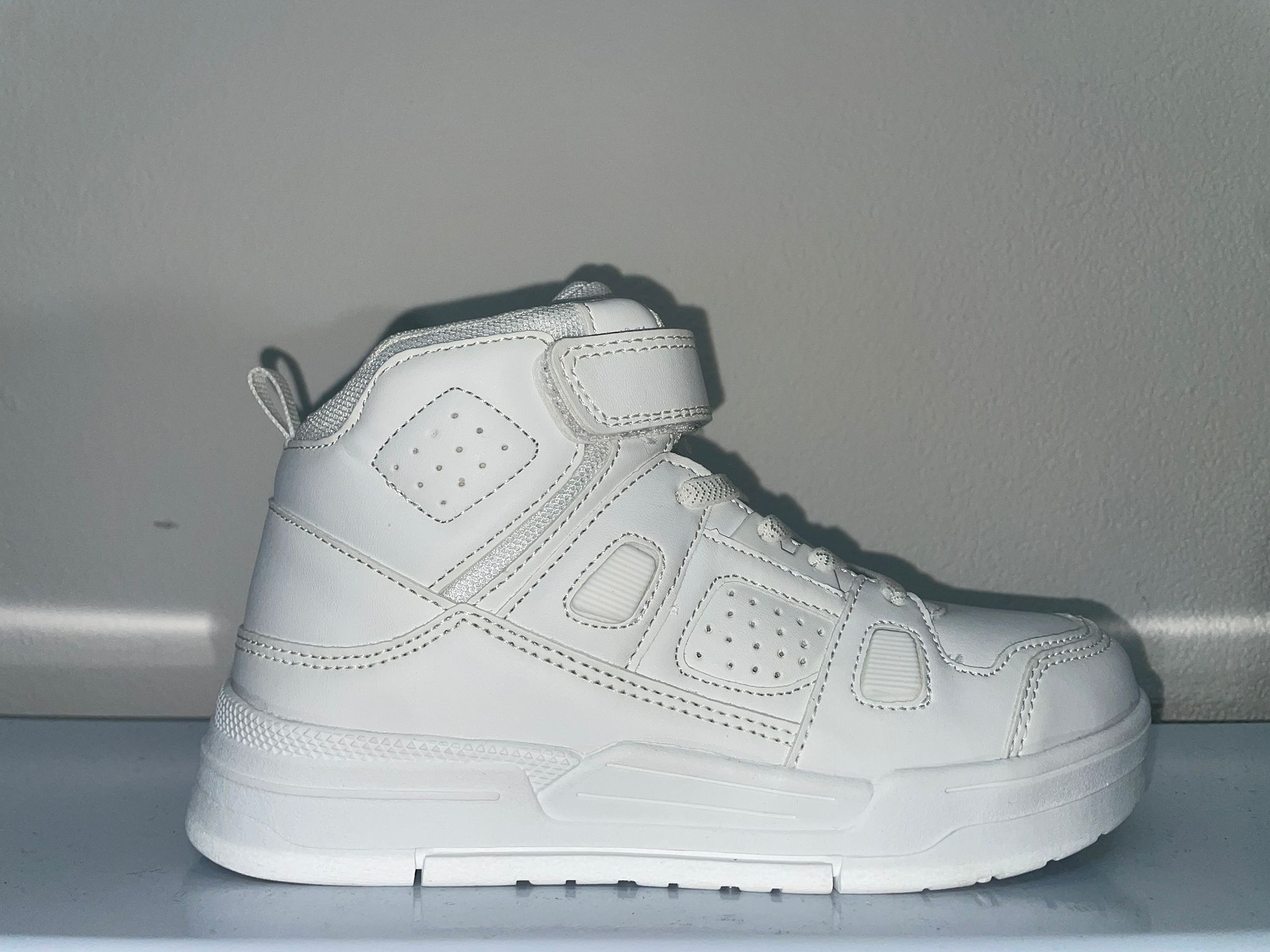 VT055-B# | Scarpette alte con strappo 