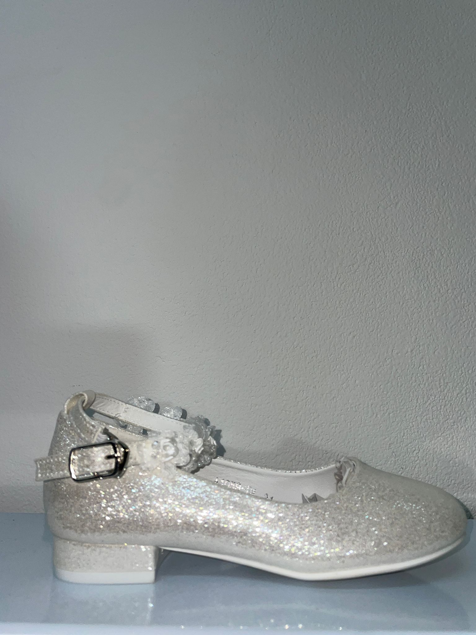 A1058-M €14 ballerine brillantinate con dettagli fiori