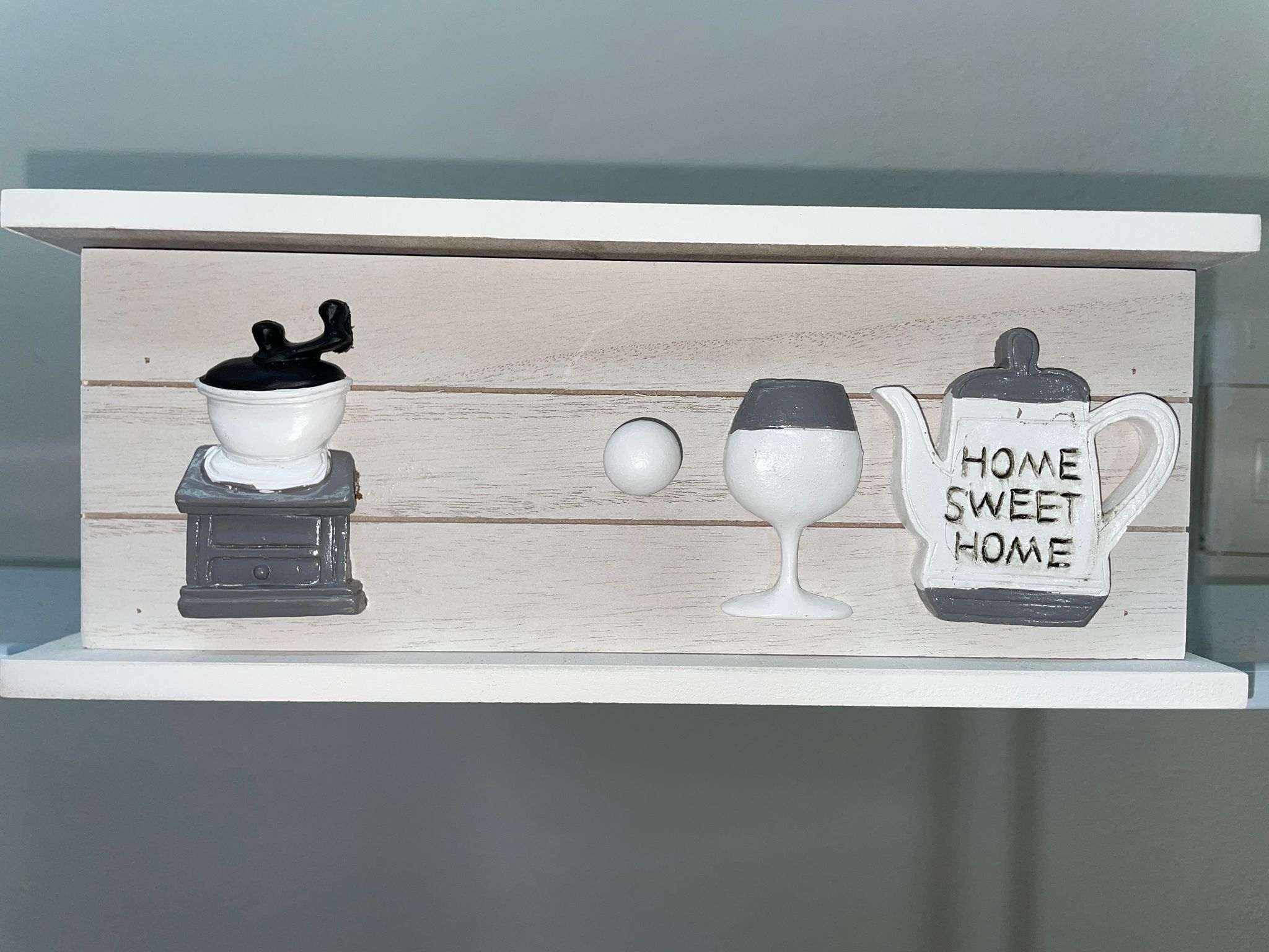 Portacialde di legno con motivo a forma di tazza