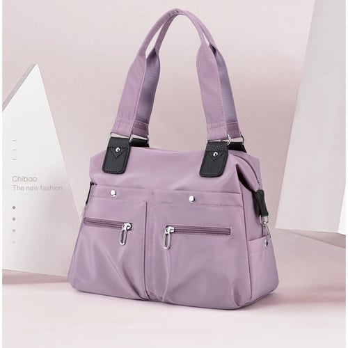 Nagy kapacitású vízálló Multi Pocket válltáska