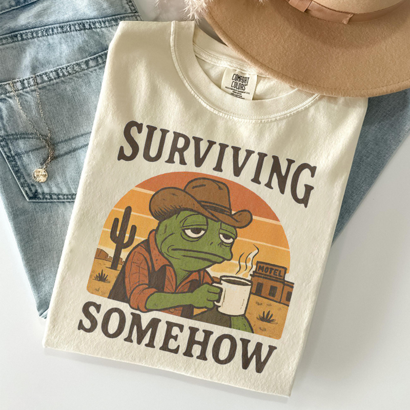 Surviving Somehow Cowboy Frog T-shirt