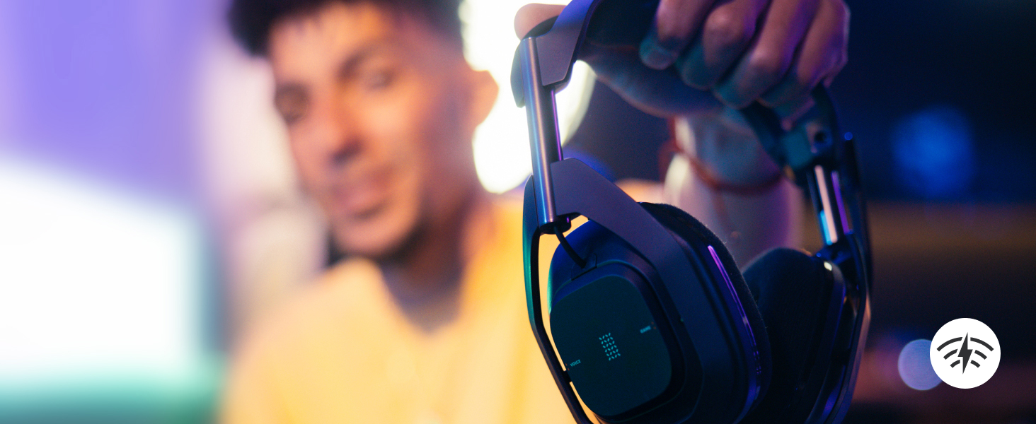a man wearing a50 x lightspeed wireless gaming headset