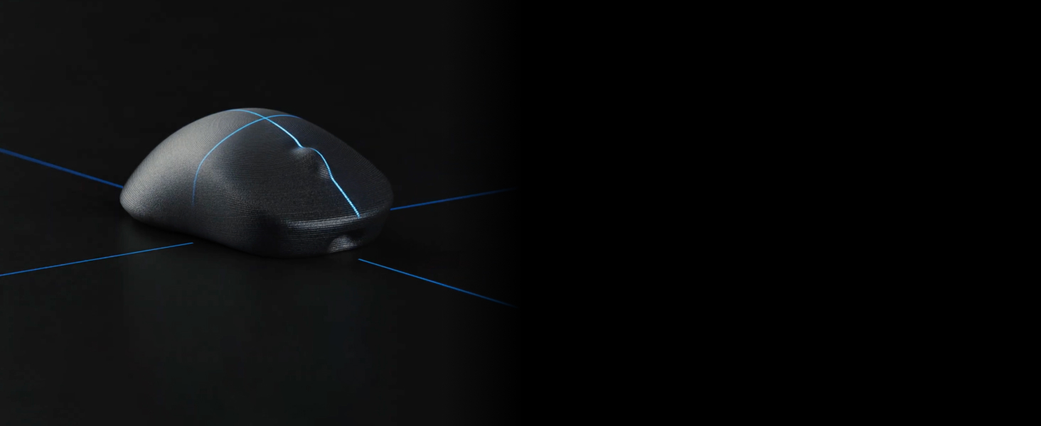 An early prototype mold for the pro x superlight 2 mouse is shown with a laser crosshair on it.