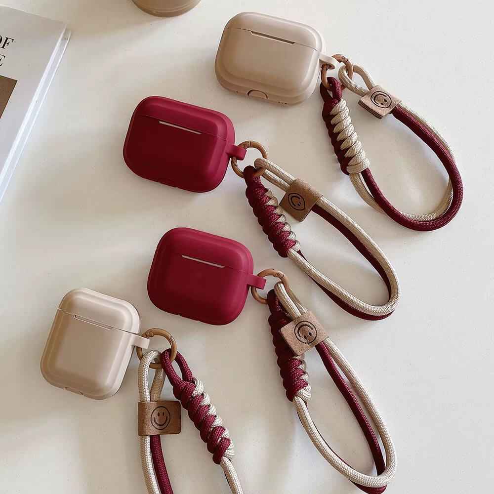 AirPods Case with Smiley Strap