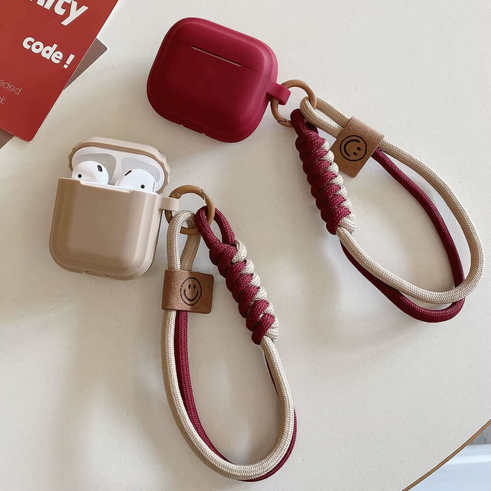 AirPods Case with Smiley Strap