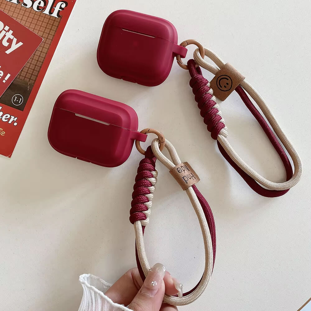 AirPods Case with Smiley Strap