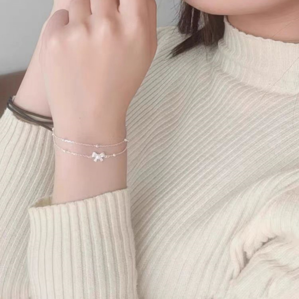 Bow - Accented Silver Bracelet | Double - Layered Whimsy for Your Wrist