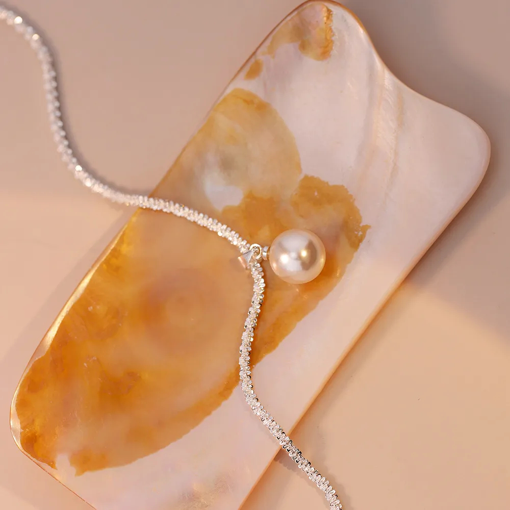 Gėlavandenių perlų karoliai 18k paauksuoti