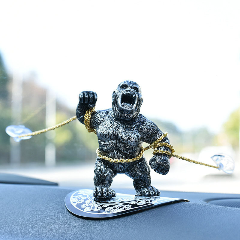 🚗🐵A gorilla trapped in a car?