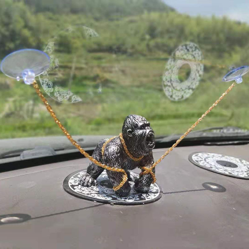 🚗🐵A gorilla trapped in a car?