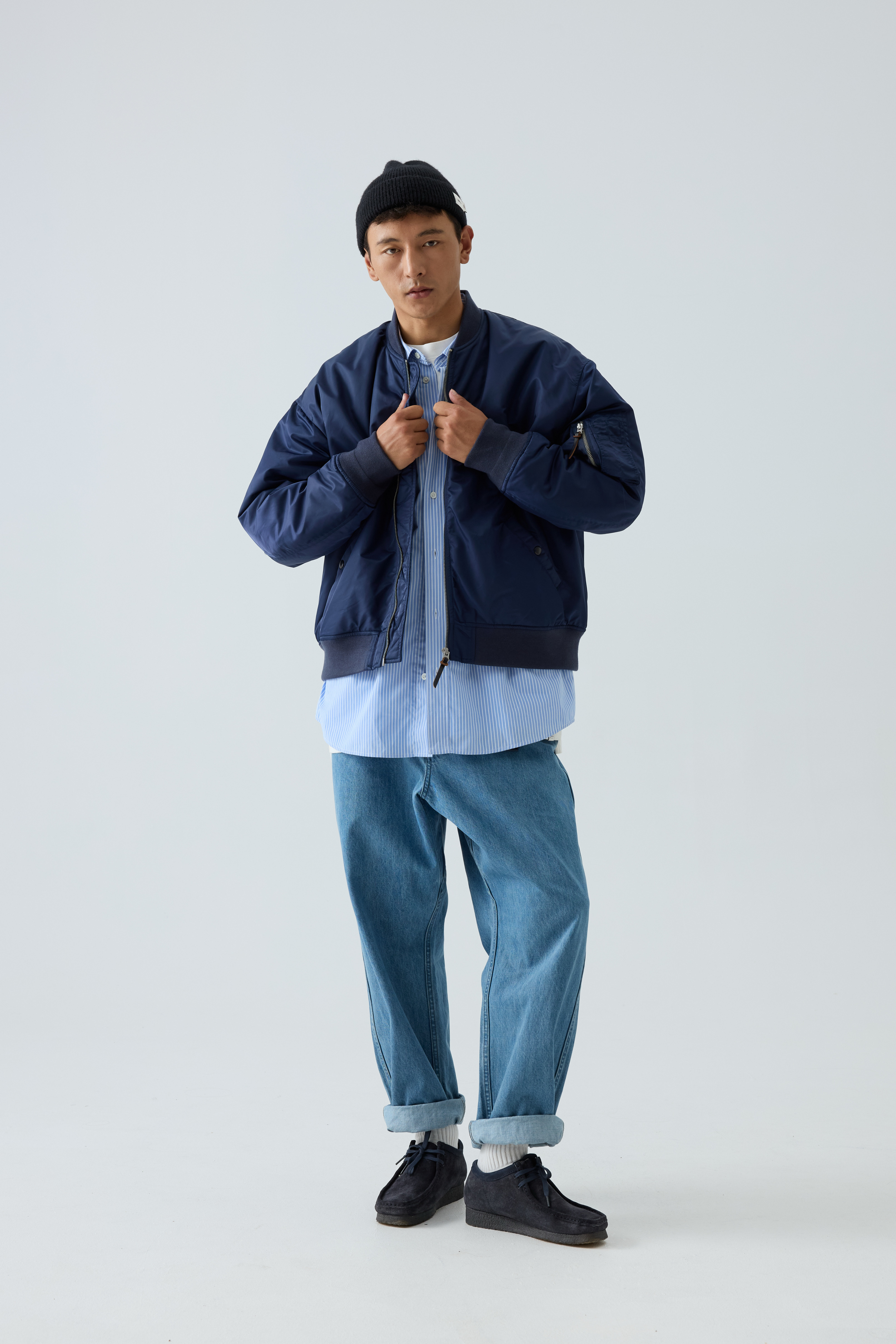 Tapered Buckle-Waist Denim Long Pants | Detail close-up
