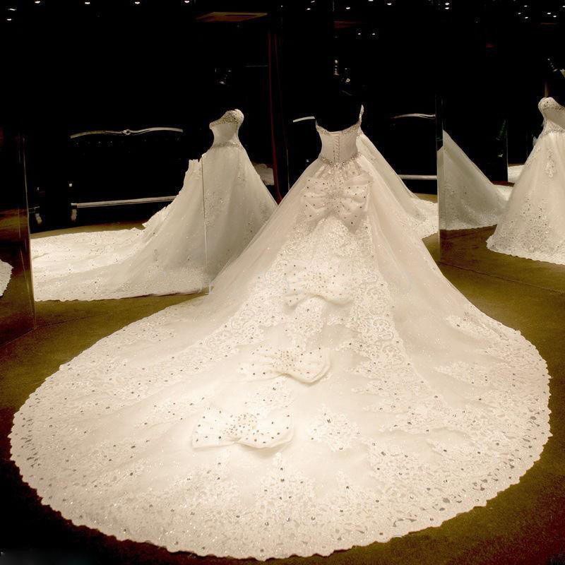 Luxurious Sweetheart Ball Gown Wedding Dress Crystal Beadss Long Train