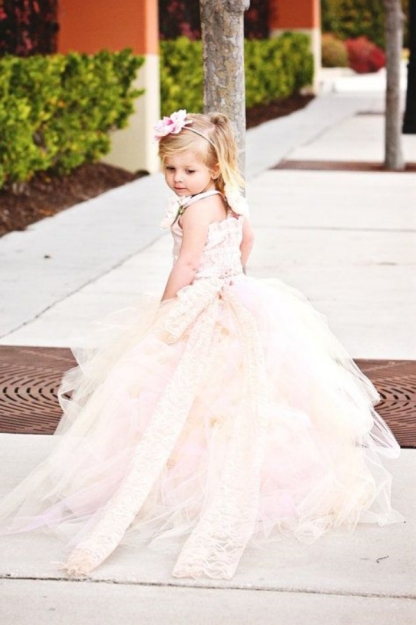 Lovely Sleeveless Tulle Flower Girl Dress With Long Train And Flowers