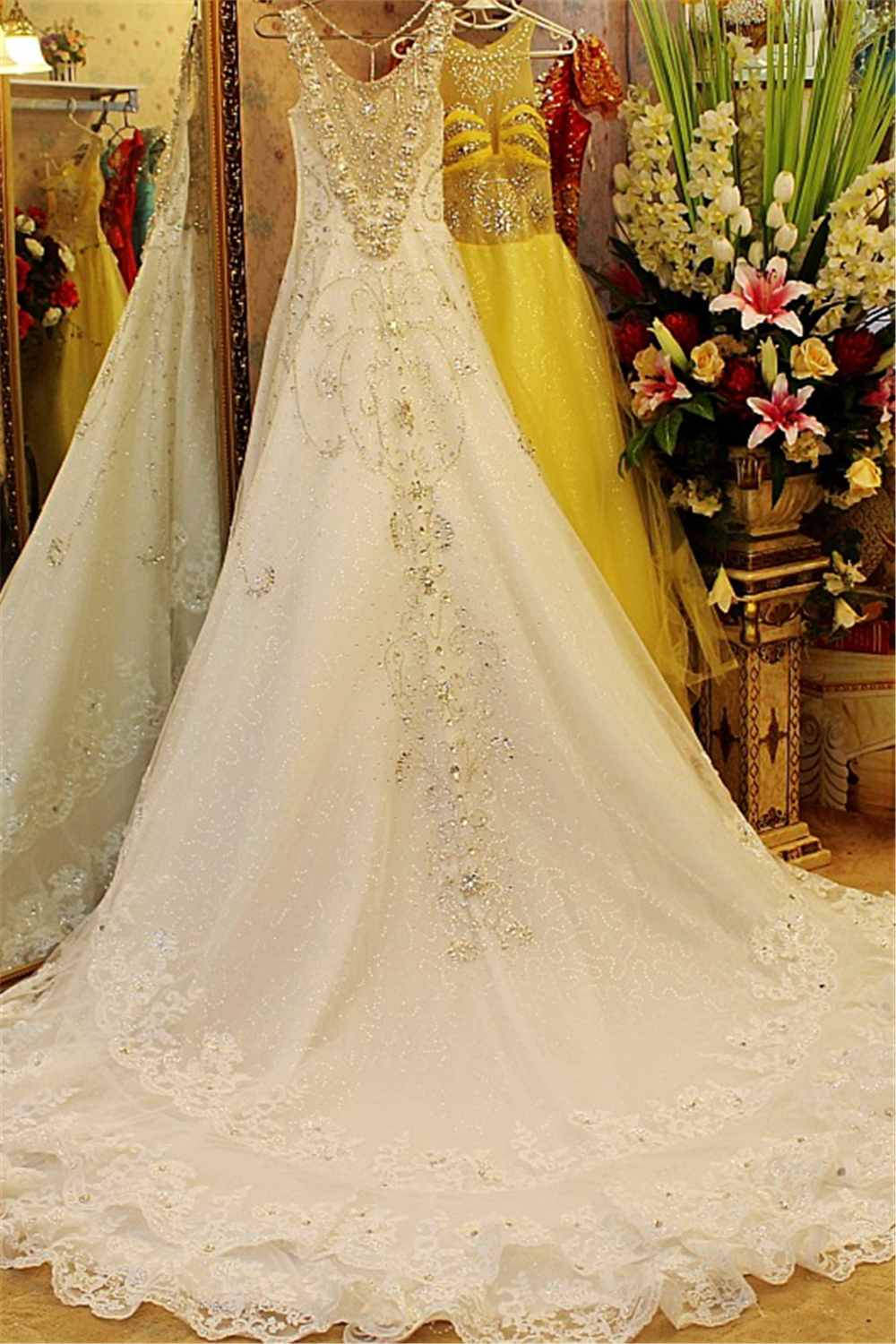 A-line V-neck Sleeveless Crystal Beads Court Train Wedding Dresses UK