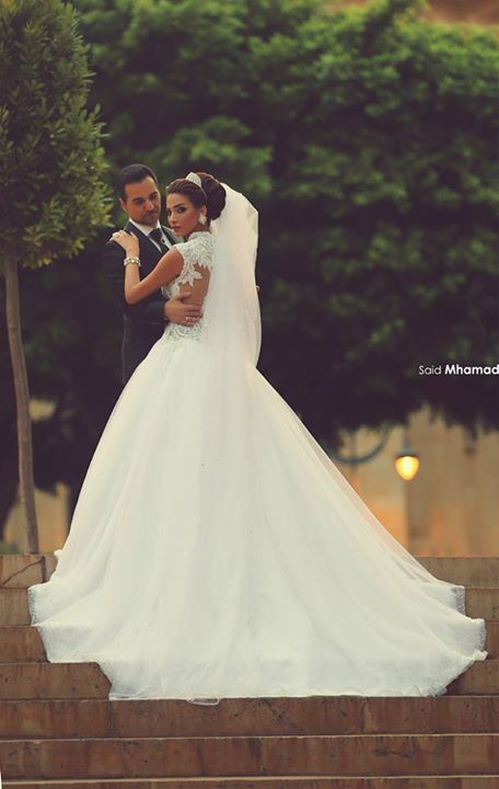 gorgeous cap sleeve tulle lace wedding dress with train