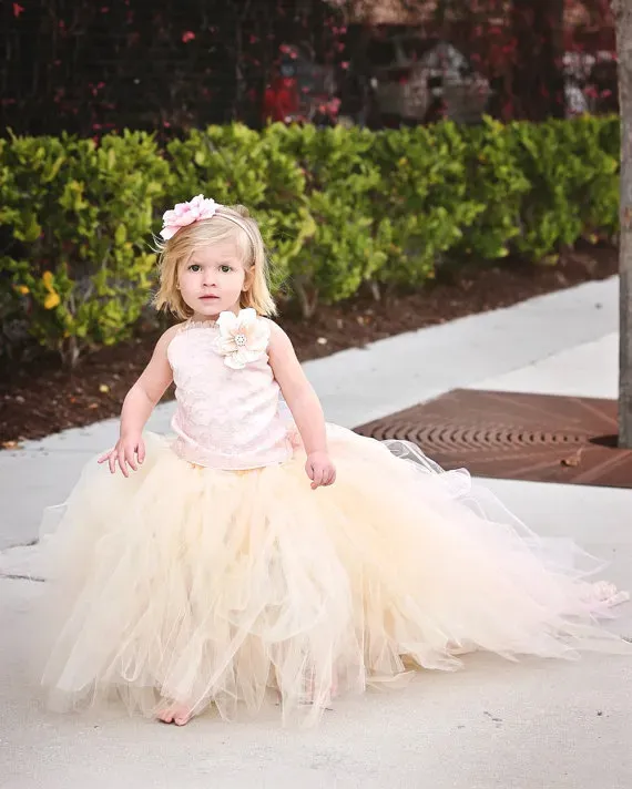 Lovely Sleeveless Tulle Flower Girl Dress With Long Train And Flowers