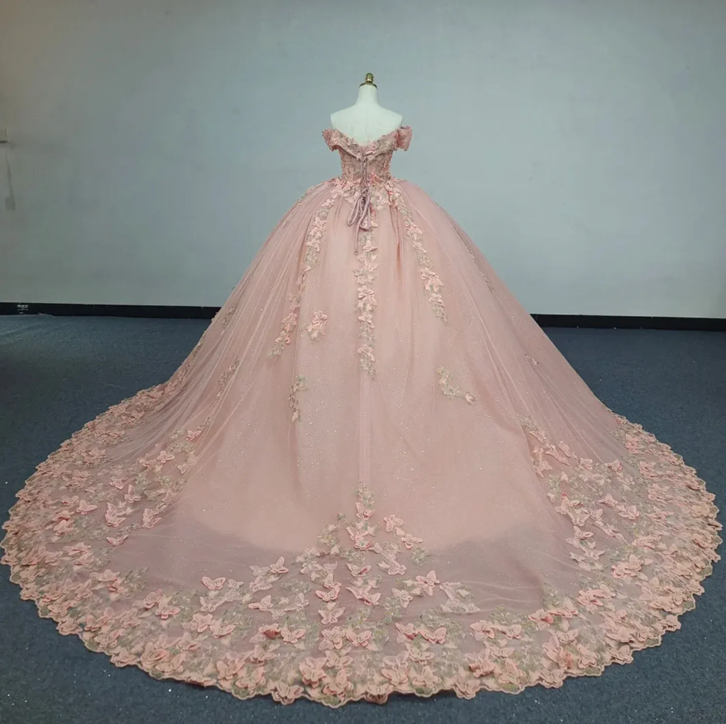 Off-the-Shoulder Pink Ball Gown with Floral Appliqued Long Quinceanera Dress