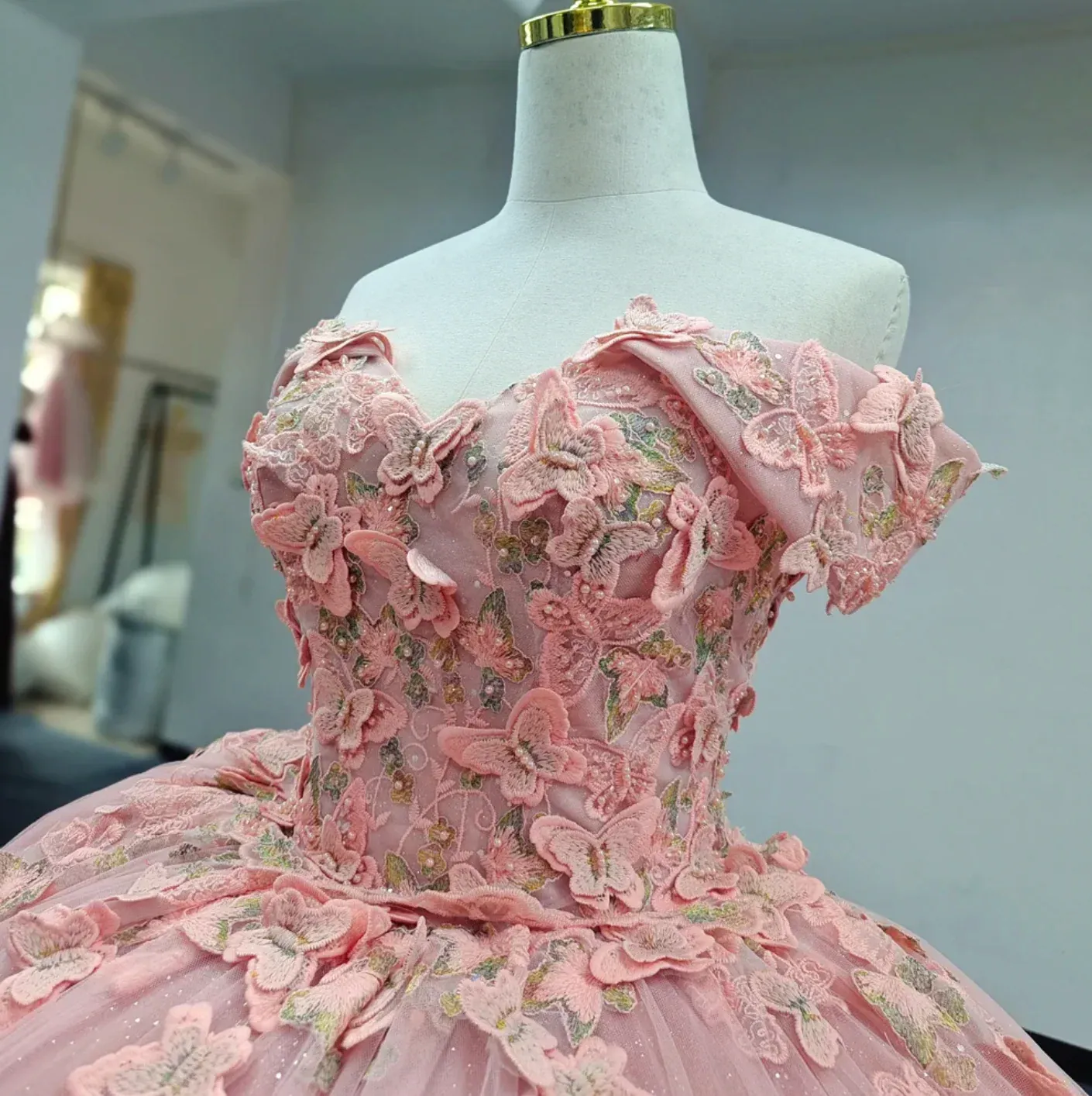 Off-the-Shoulder Pink Ball Gown with Floral Appliqued Long Quinceanera Dress