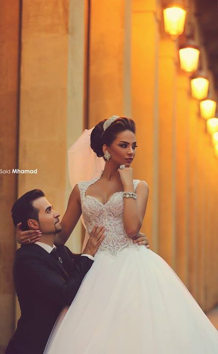 gorgeous cap sleeve tulle lace wedding dress with train